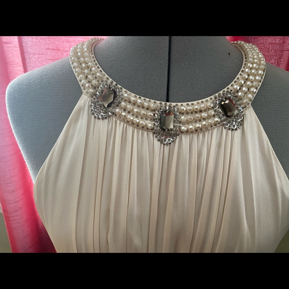 Jones New York cocktail dress, size 10P. Empire waist. Top neckline is jeweled.